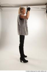 NIKOL STANDING POSE WITH TWO GUNS